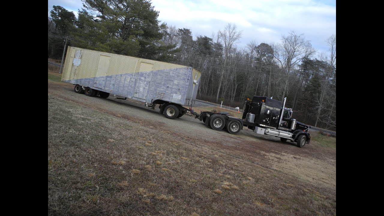 Moving an Old Storage Trailer with a Single Axle Converter Dolly