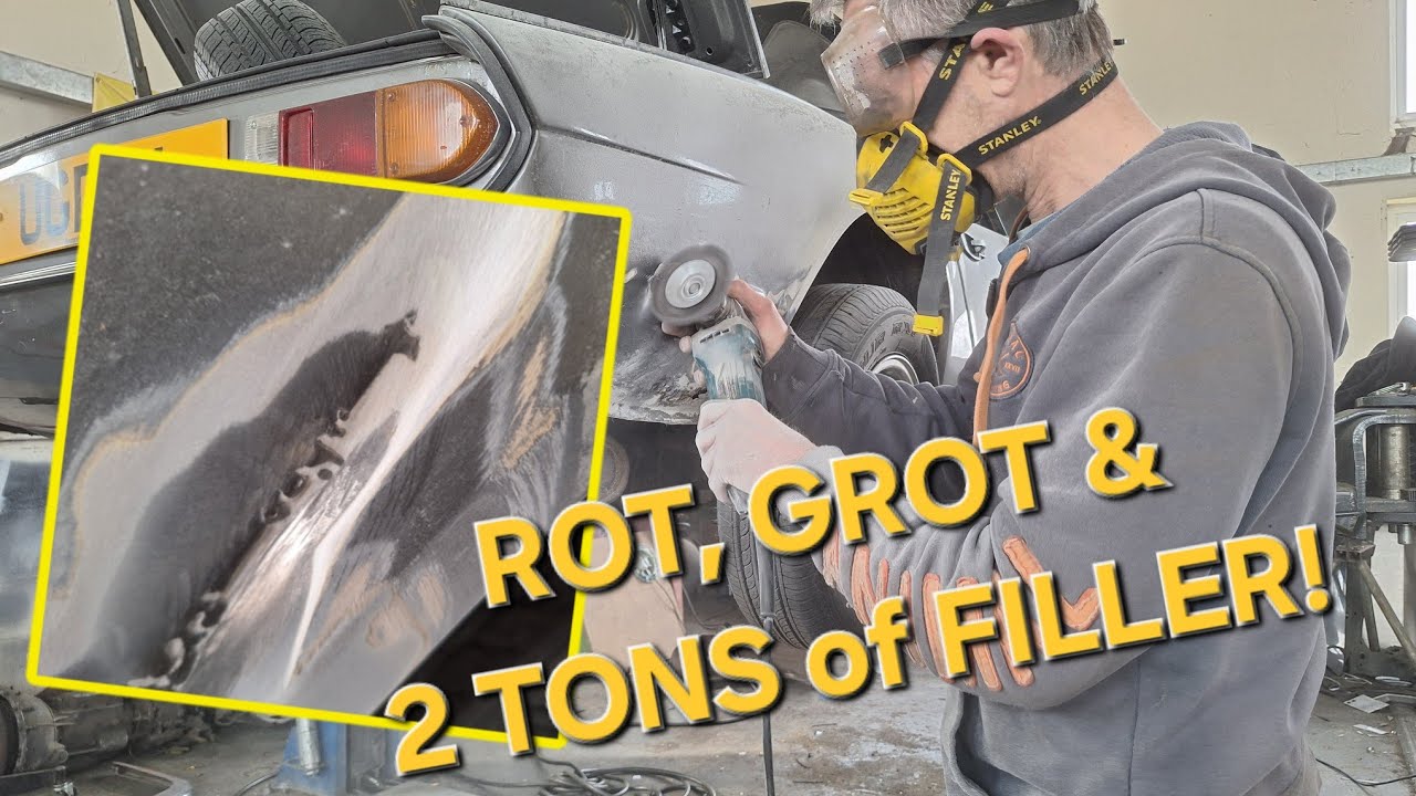Triumph Spitfire/GT6 rear wing/fender corner repair - Removing lots of filler, rot & bad welding pt1