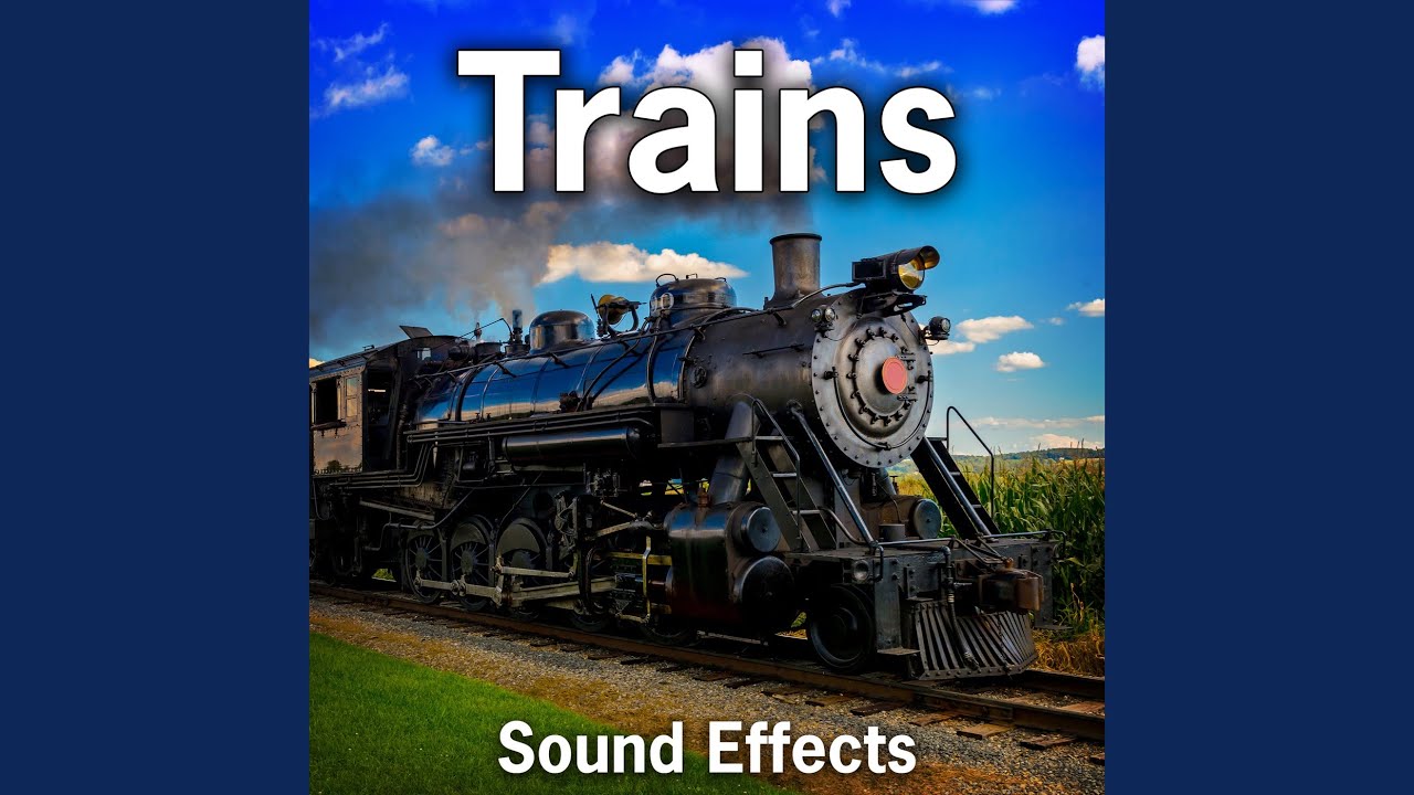 Railroad Crossing: Train Approaches Crossing with Horn