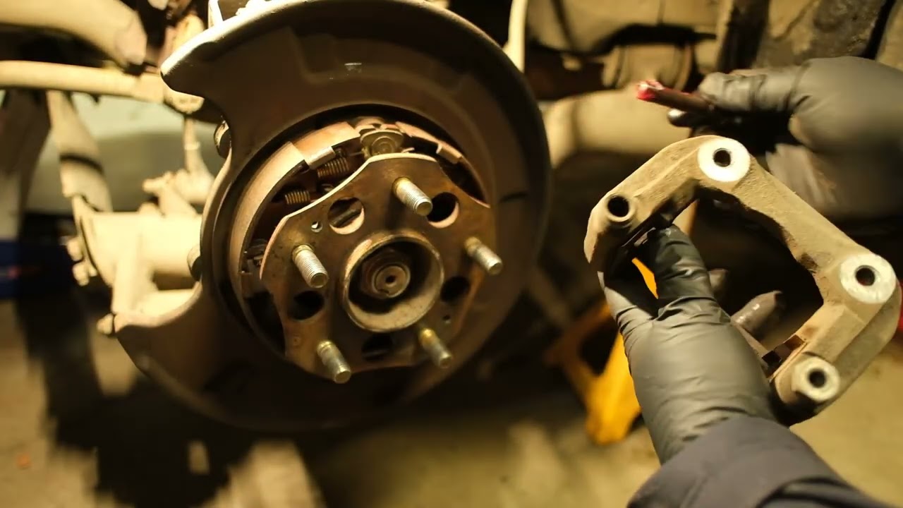 Honda Element Rear CV Axle, Brake Disc and Brake Pad replacement.