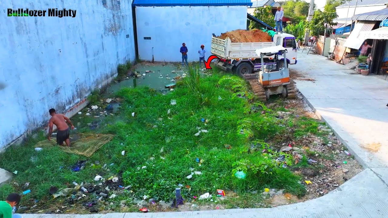 Small Project, Processing Filling Up The Land, Bulldozer Working, Dump Truck unloading