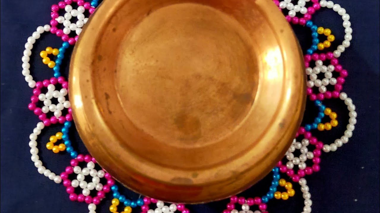 Beads rangoli: समईभोवतीची रांगोळी