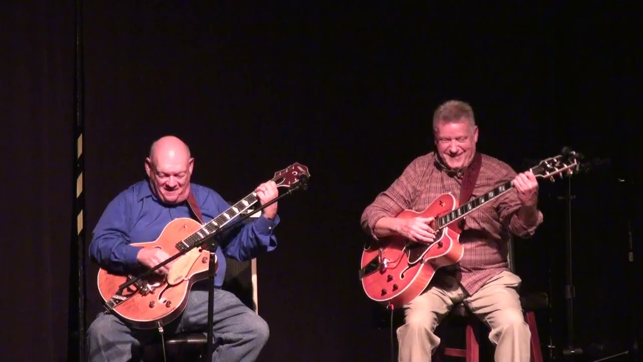 Two world class thumbstyle guitar players, Paul Moseley and Robert Anderson