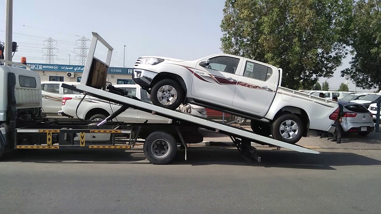 Toyota Hilux GLS 2.4L Diesel 4x4 loaded on to Recovery Truck in Dubai, UAE