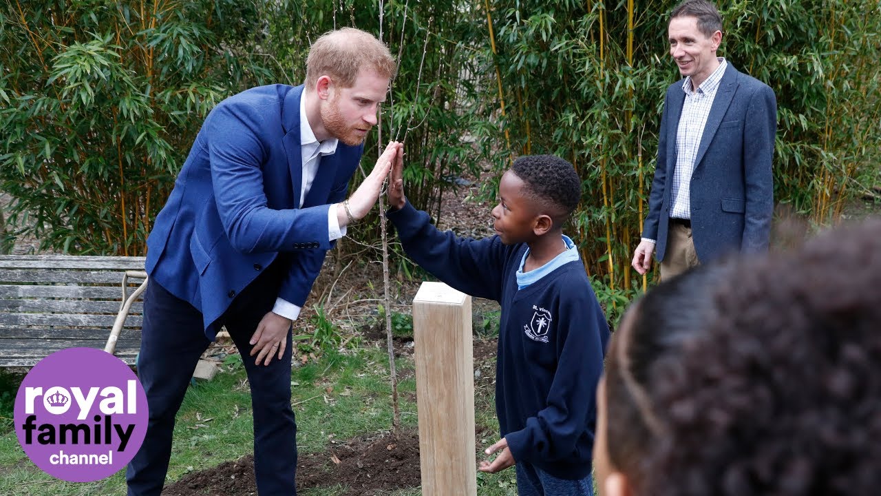 The Duke of Sussex jokes with pupils during school visit