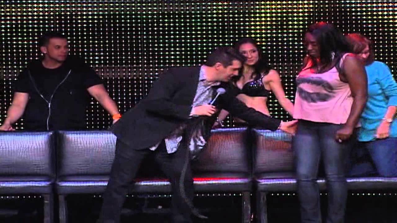 Hypnotized guy grabs another dude's junk! Hilarious!