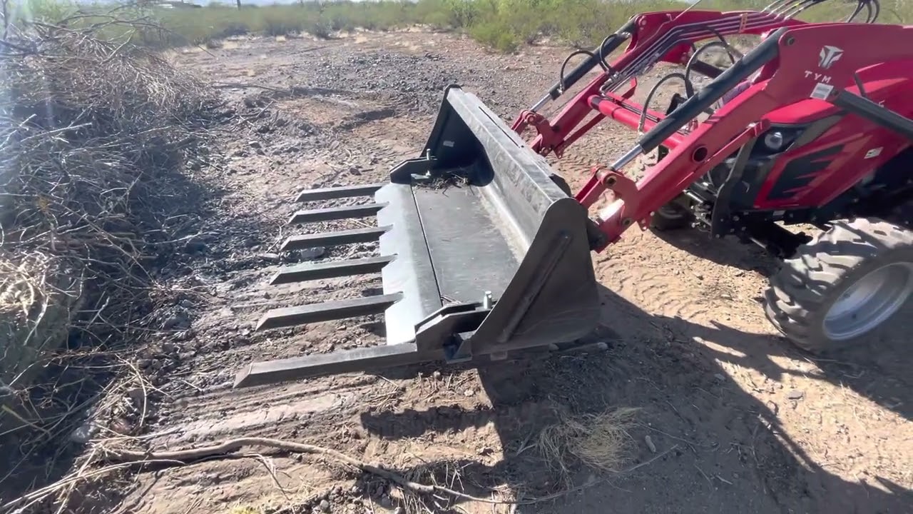 Titan Attachments clamp on Debris Forks final report