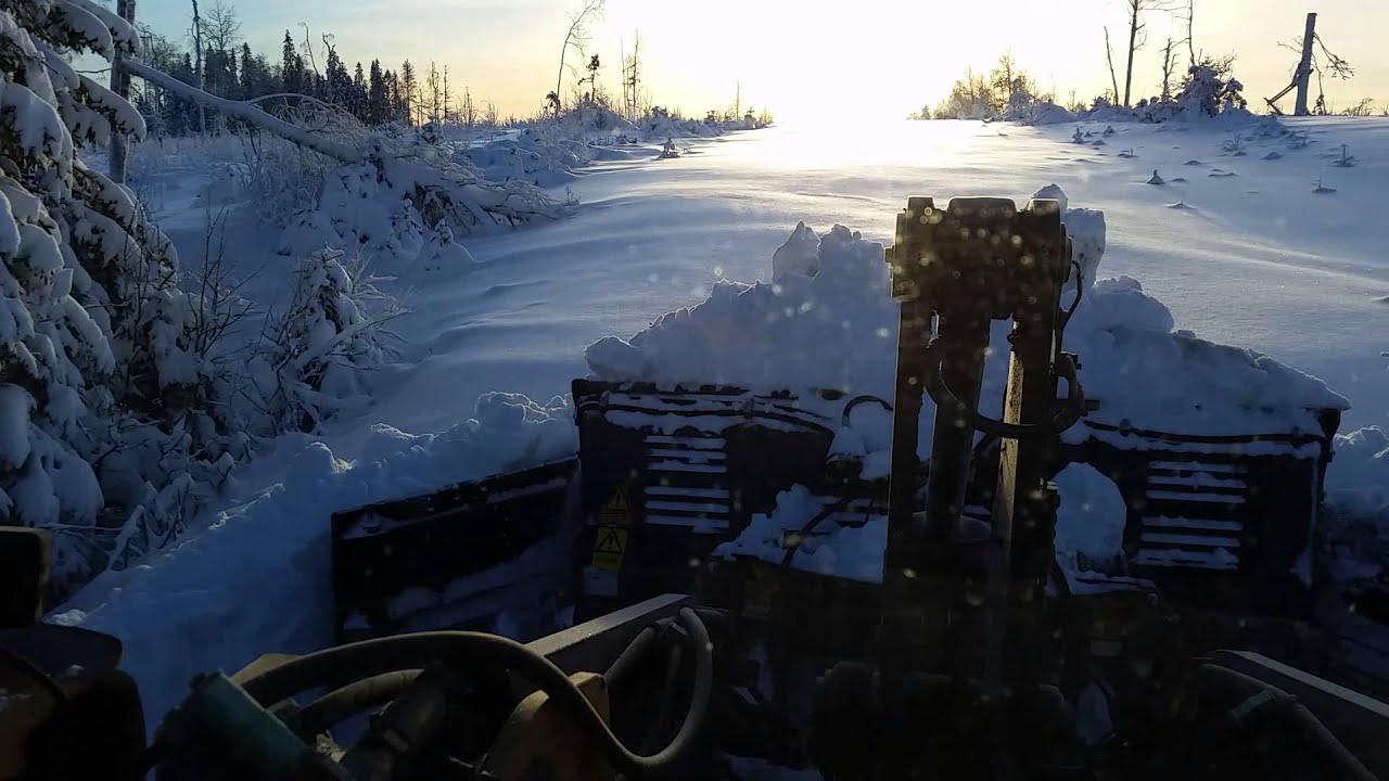 Volvo L90e plogar snö med Drivex klaffskopa