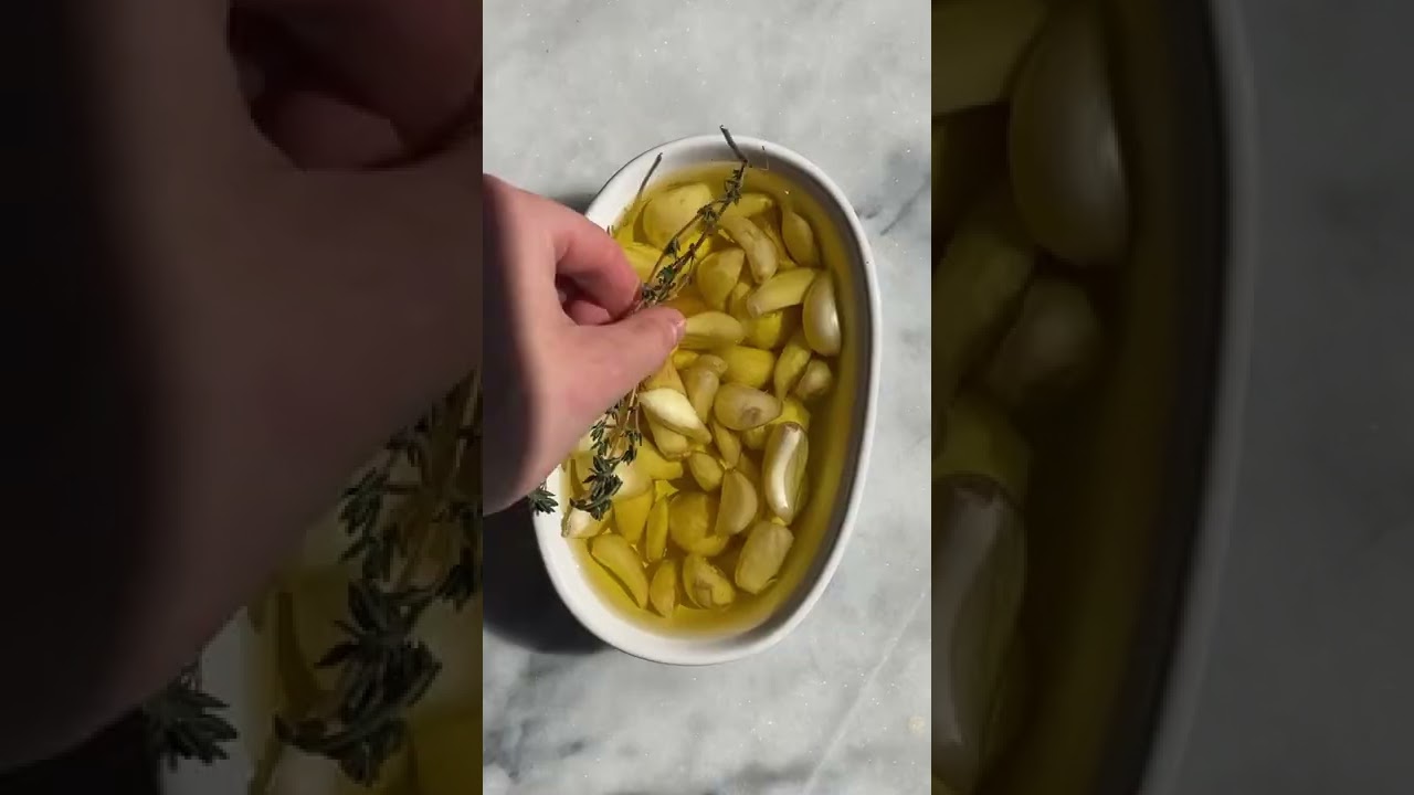Roasting garlic cloves in olive oil allows them to become mild, caramelized, and tender