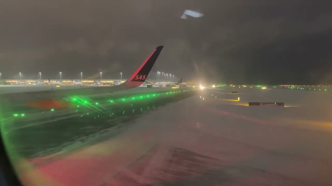 Landing at snowy Oslo Gardermoen Airport