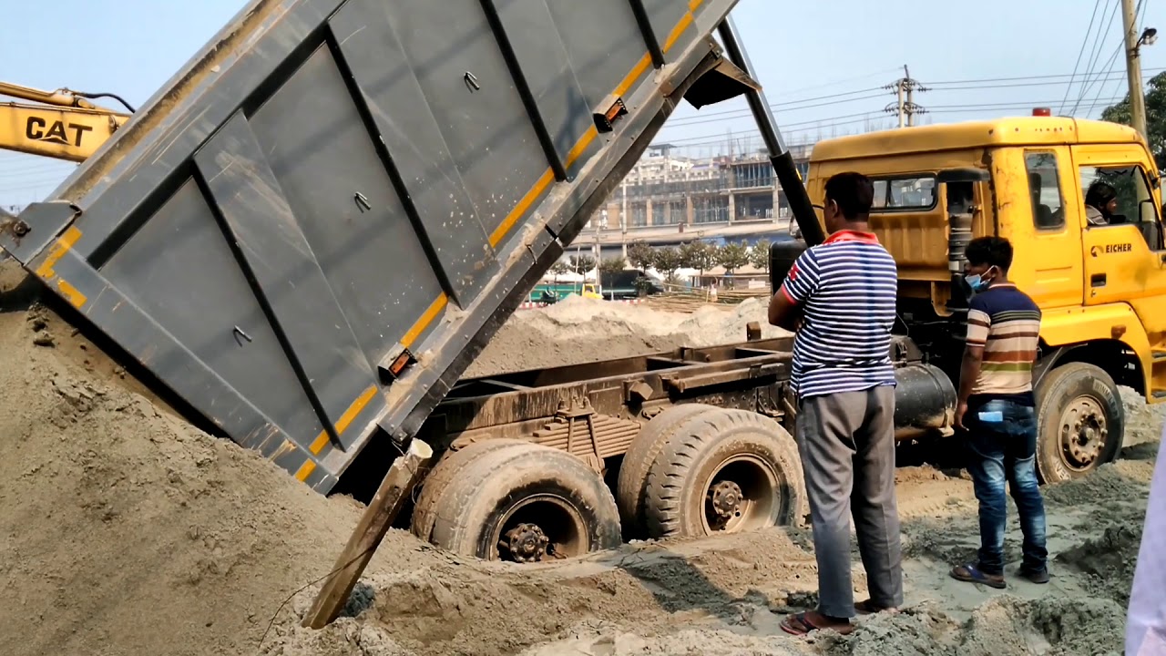 Ten whller eicher truck unloding 35 tons sand
