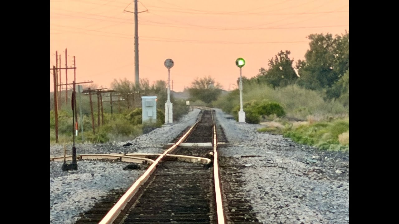A UP westbound manifest train with rear DPU through Queen Creek AZ 2-22-26