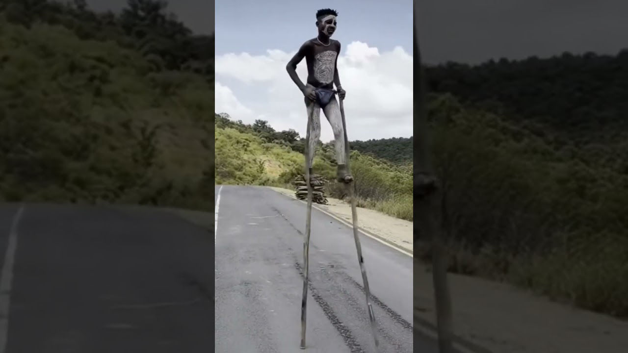 amaizing omo valley, stilt walkers from banana tribe 