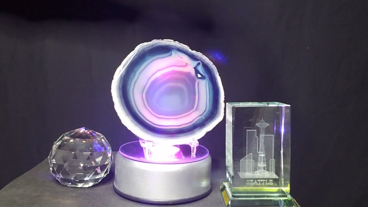 Motorized 360 degree rotating color LED light display stand