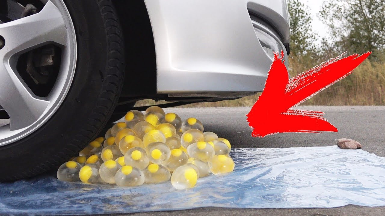 EXPERIMENT: CAR VS 100 EGG STRESS BALLS !!!