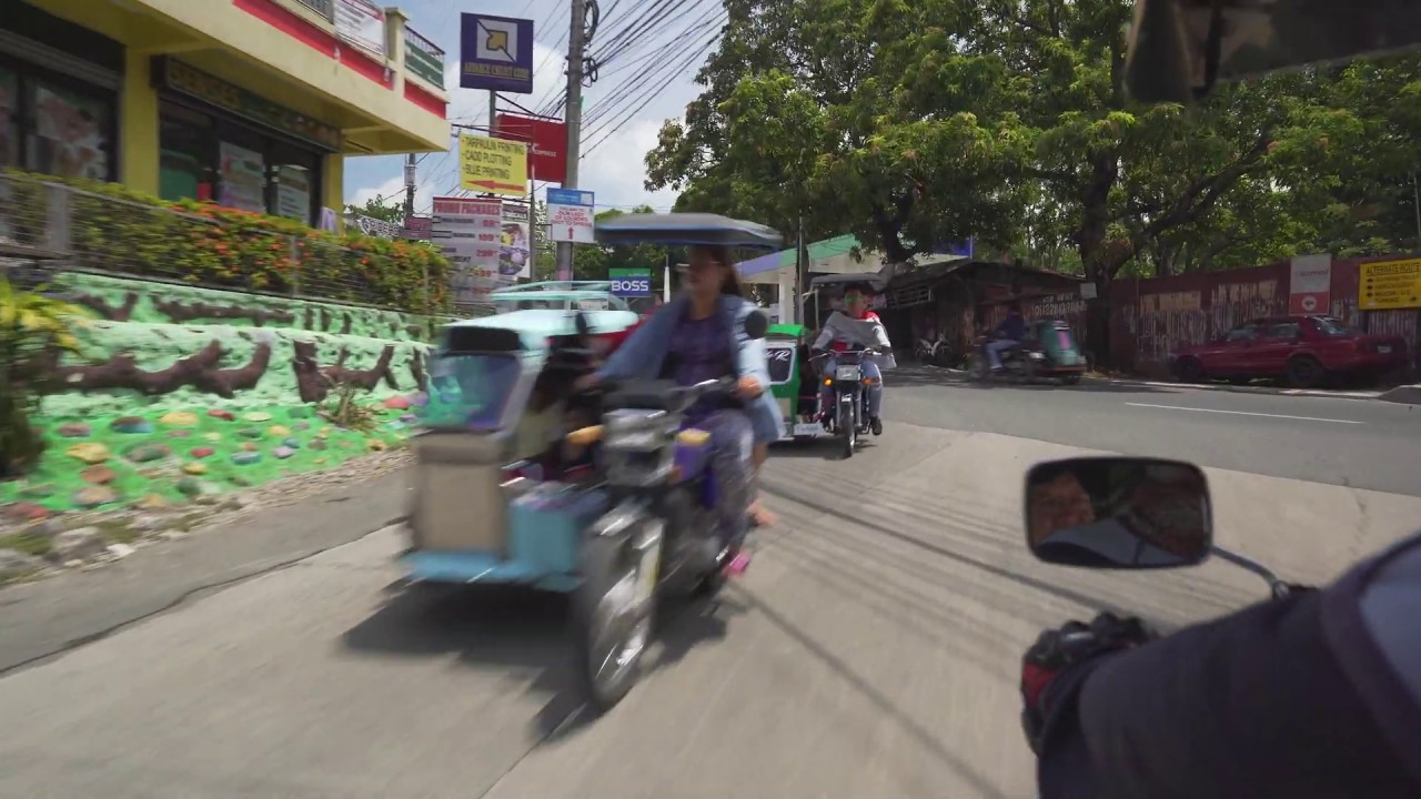 Philippines, tricycle ride from Dela Costa Homes III to Cebuana