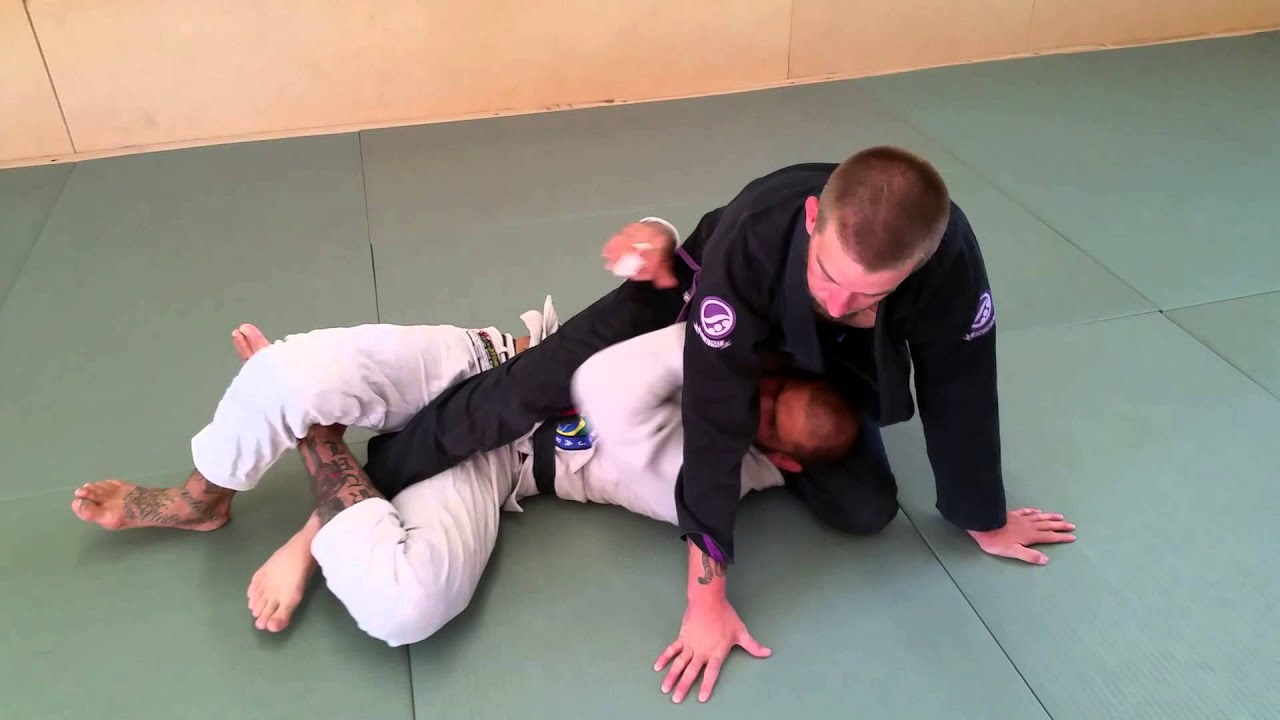 Deep half guard to bridge sweep