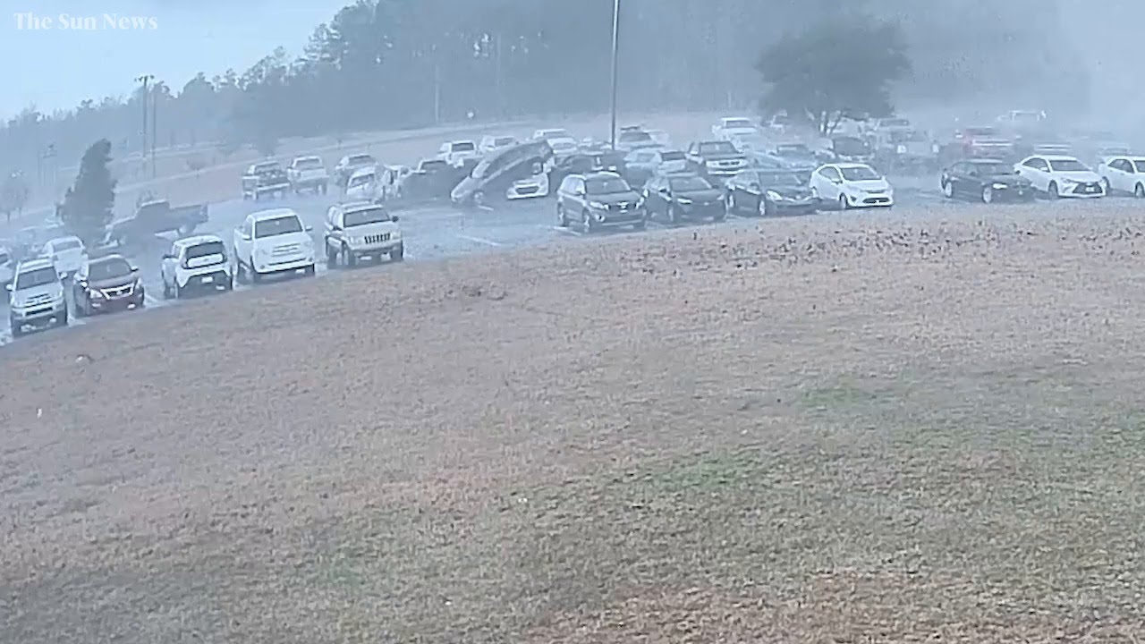 Surveillance video shows tornado tossing cars at Loris High School