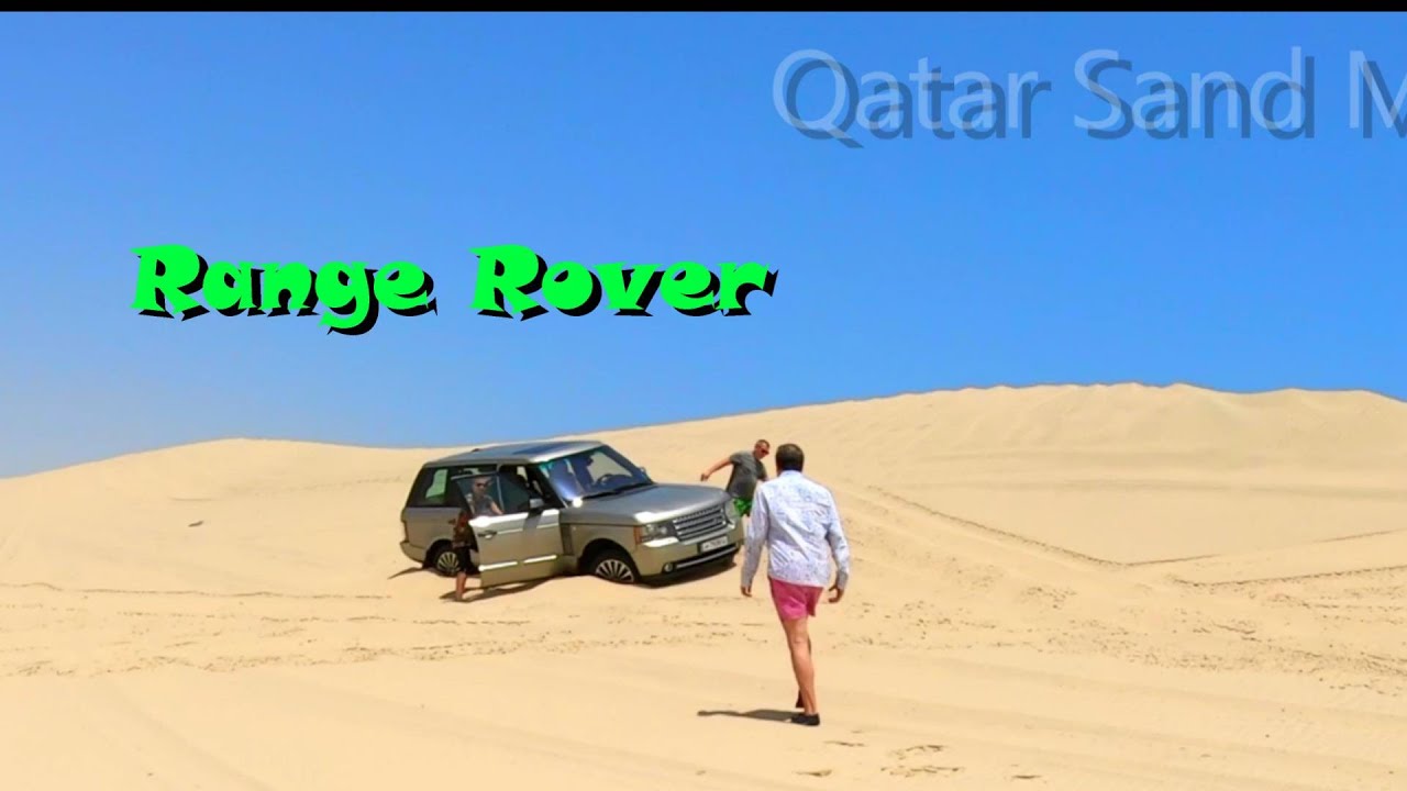 Range Rover stuck in sand dunes in the Sealine area of the Qatar desert