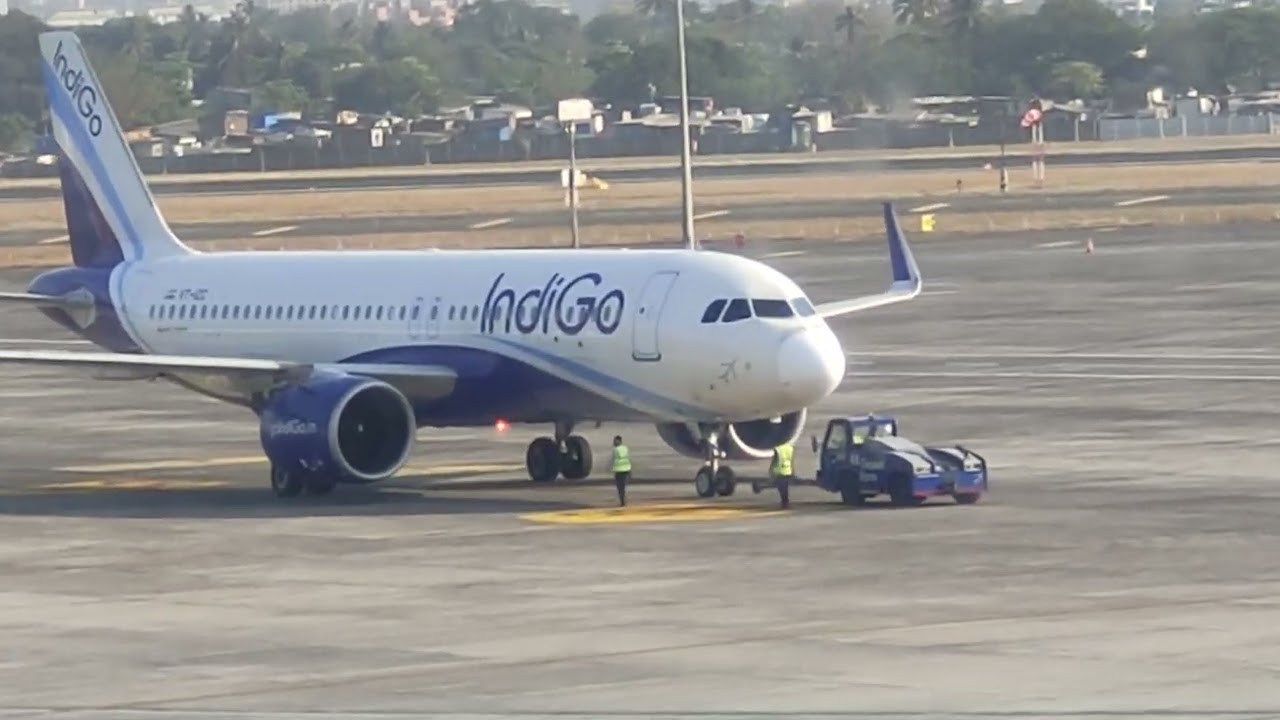 BEAUTIFUL VIEW OF MUMBAI AIRPORT/ AEROSPACE AEROPLANE AIRCRAFTS PUSHBACK OF INDIGO AIRLINES AIRBUS