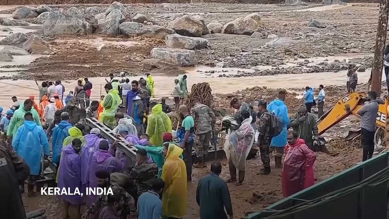 Rescue workers at area of landslide in Kerala, India