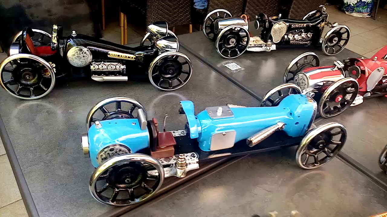 TERRY ROSSBERG artist , manufactures these cars with old SINGER sewing machines