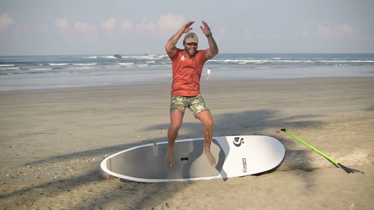 Functional Surf Stance, with a paddle