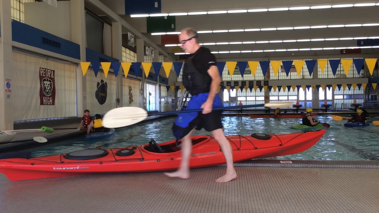 Rolling a loaded Kayak.