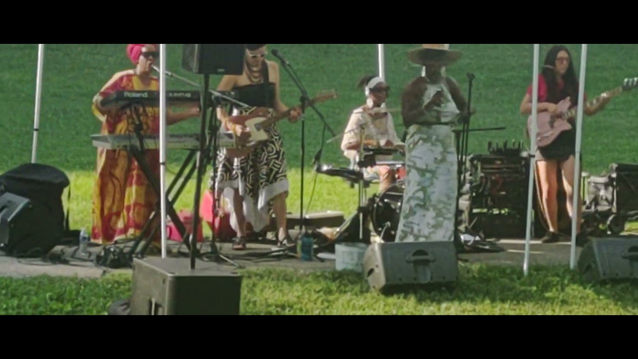 Strikers Posse Sistrens in Power smoking hot all female reggae band! In Wyman Park Dell today!!!