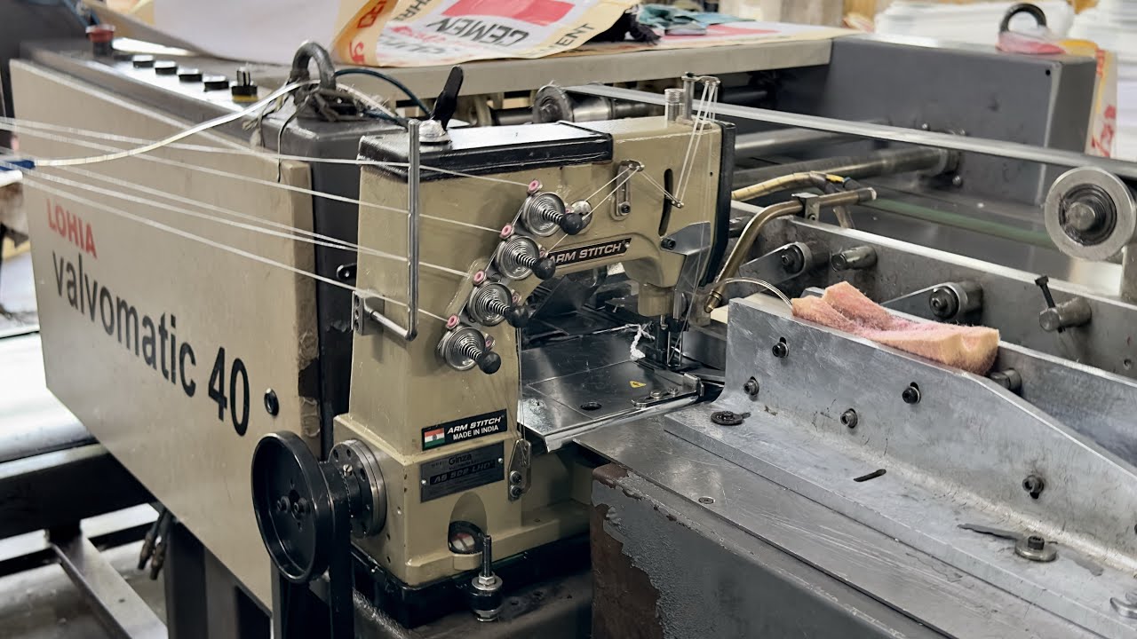 AS 502 LHD: LEFT HAND, 2 Needle, 4 Thread, High Speed, Chain Stitch Machine. for, VALVOMATIC.