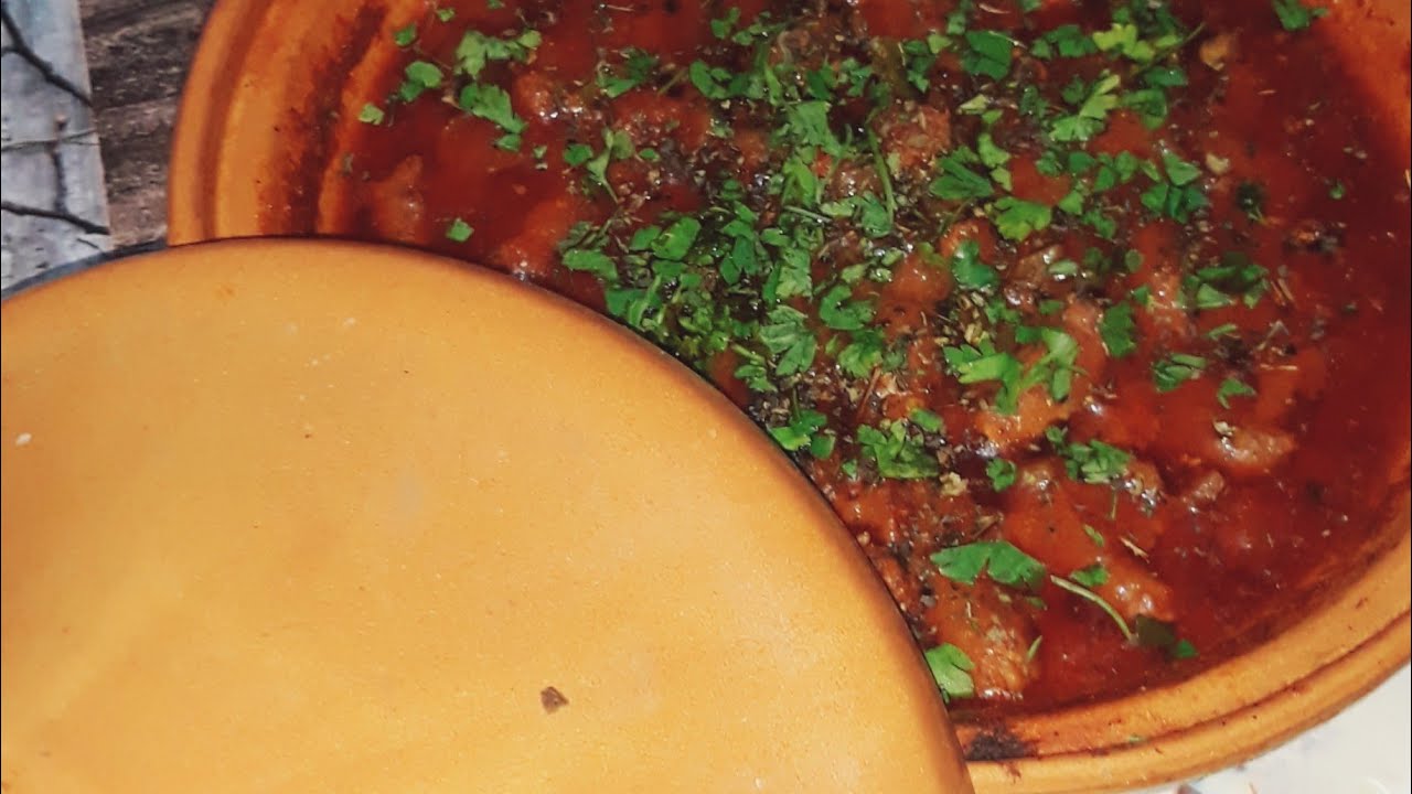 Tajin de Salchichas (تاجين المرقاز)