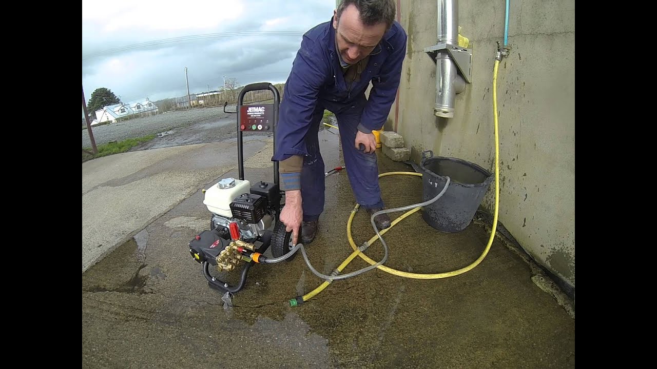 SUCKING WATER FROM A BARRELL