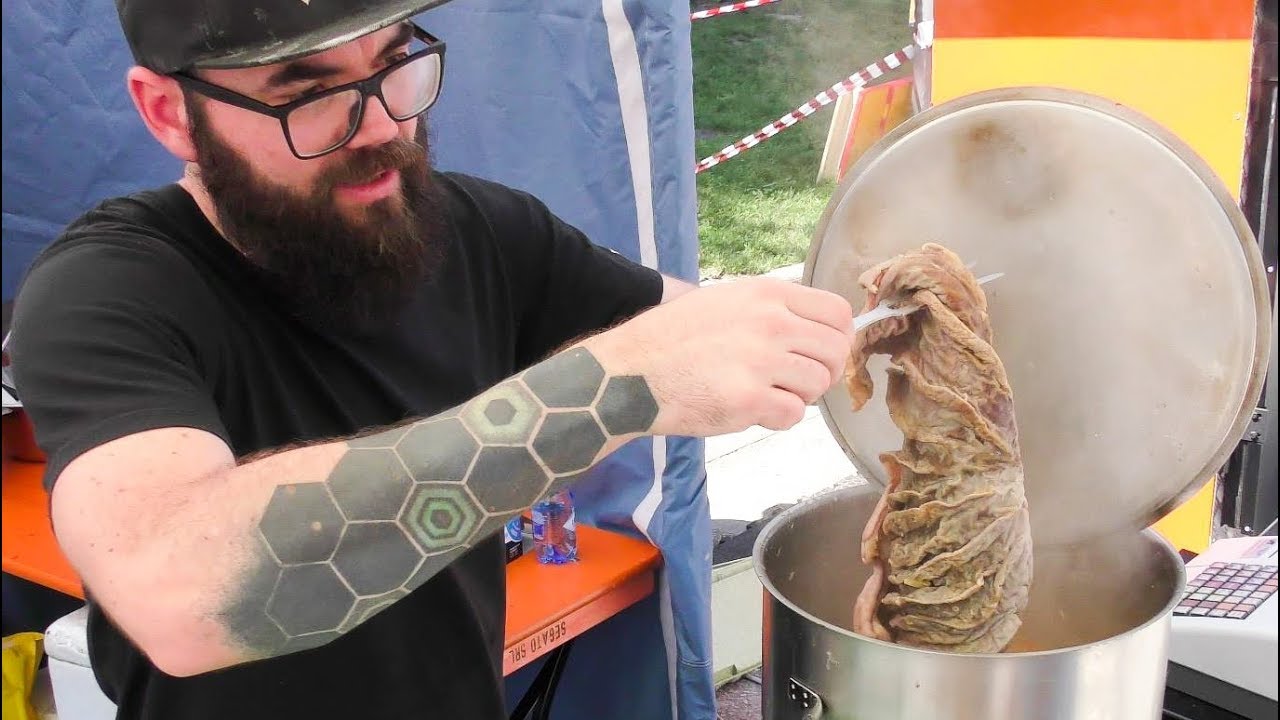 Traditional 'Lampredotto' Sandwich from Tuscany. Street Food in Milano, Italy