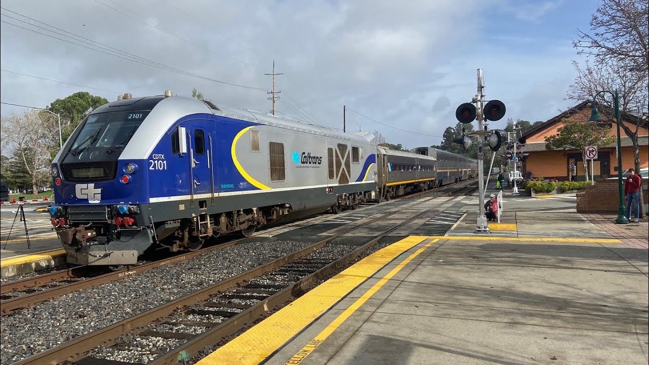 Trains in Poor Weather Conditions at Martinez w/ Amtrak Reverse Move and Delayed Amtrak Trains