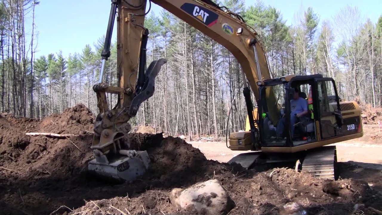 Cat 315DL Loading Dump Truck 2