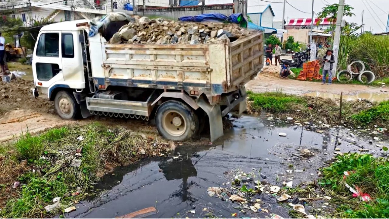 Starting A New Project!! Filling Land By Dump Truck Unloading soil with Komat'Su D20P Dozer