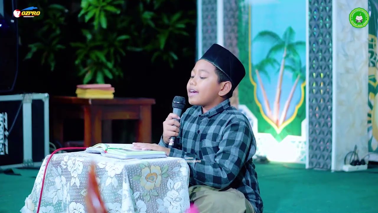 Pembacaan ayat suci Al Qur'an oleh Ahmad Dzaky Mahzuz Nur Syihab