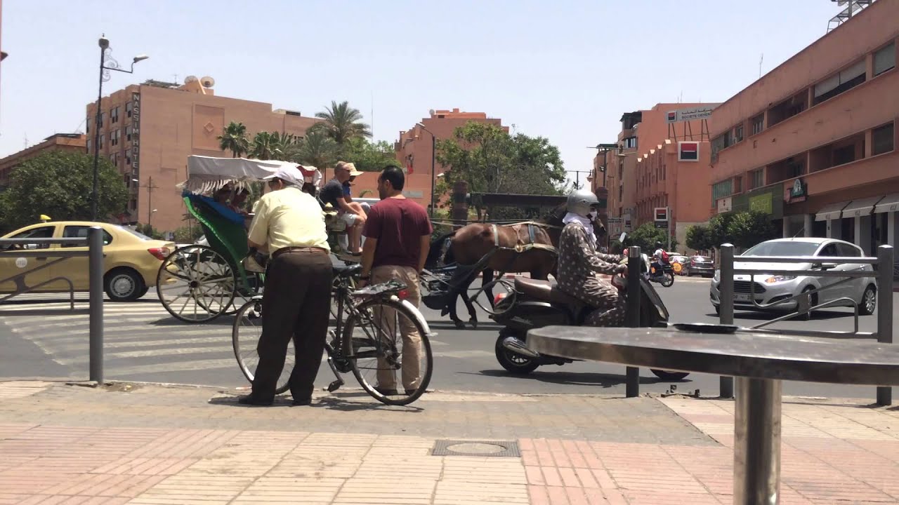 Traffic on Avenue Mohamed V crossing in Marrakech, Morocco.