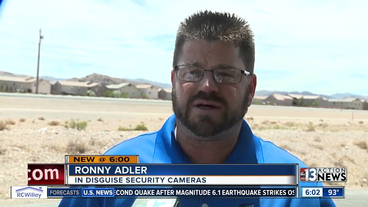 Man seen spraying over surveillance cameras