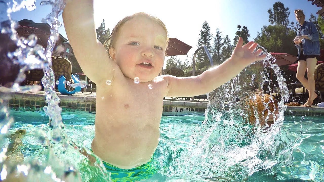 NiKO WATER SLIDE! Family Vacation Pool Day Swimming with Kids and... Time Travel??