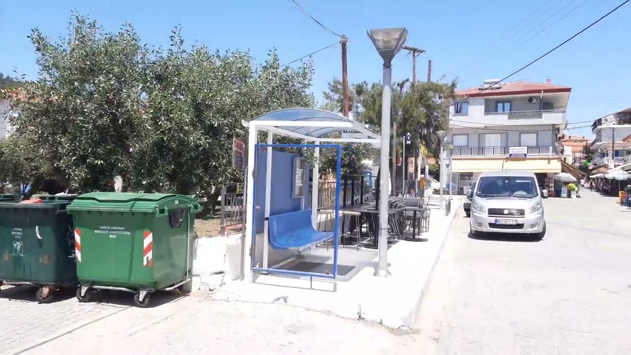 Walking in Sarti, Greece from the supermarket to the church