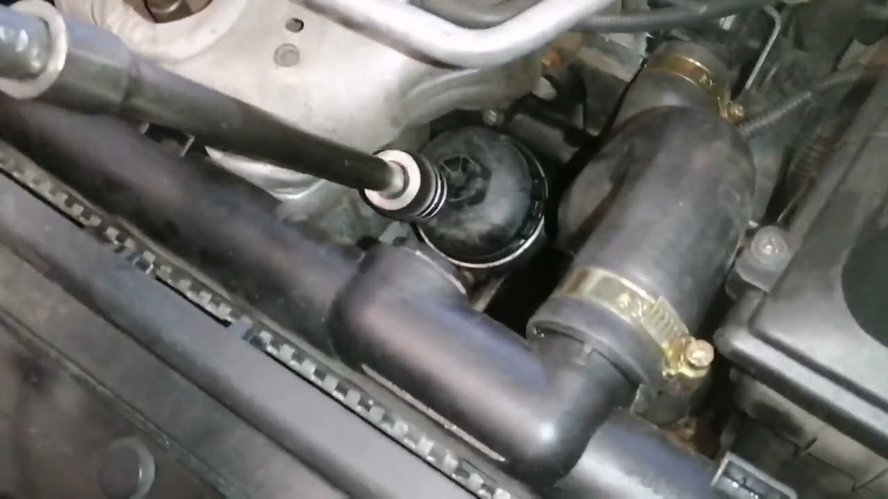 Como Sacar el Filtro de Aceite Peugeot 206