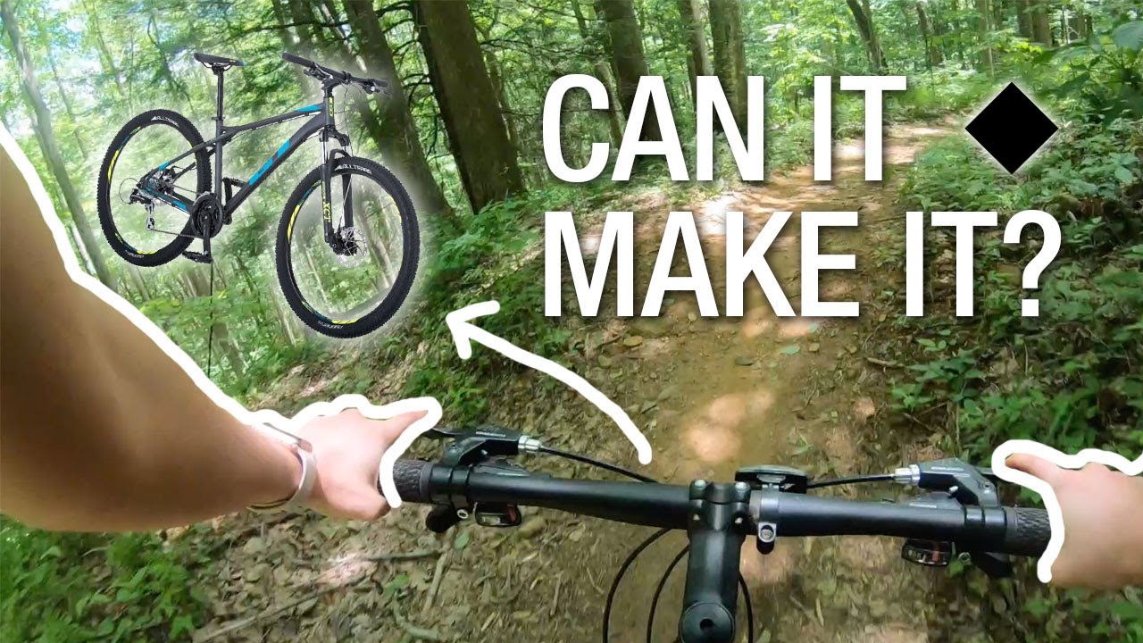 Riding a Budget XC Mountain Bike Down a Black Diamond Trail