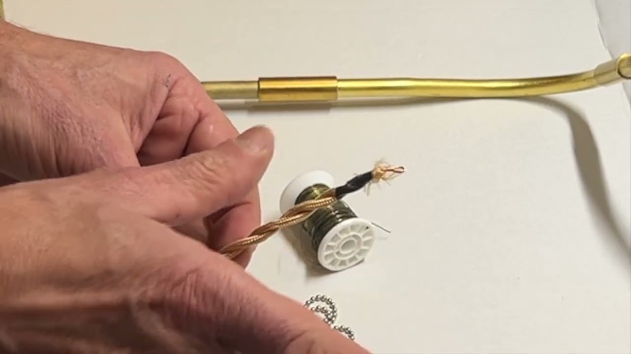 Passer un cable electrique dans un luminaire