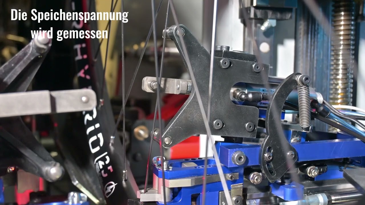 Fahrrad Hinterrad einspeichen und zentrieren per Einspeichroboter