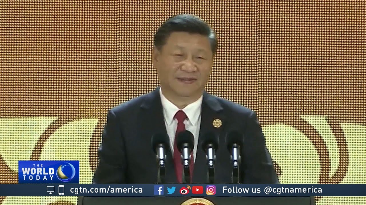President Xi embraces globalization in front of business leaders at APEC