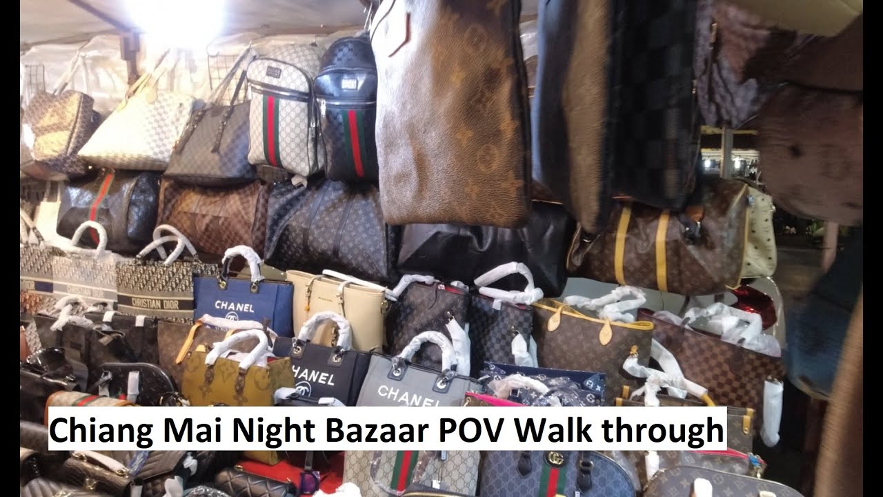 Chiang Mai Night Bazaar. Fake goods, real food, good prices! Walk through Chiang Mai Night Market