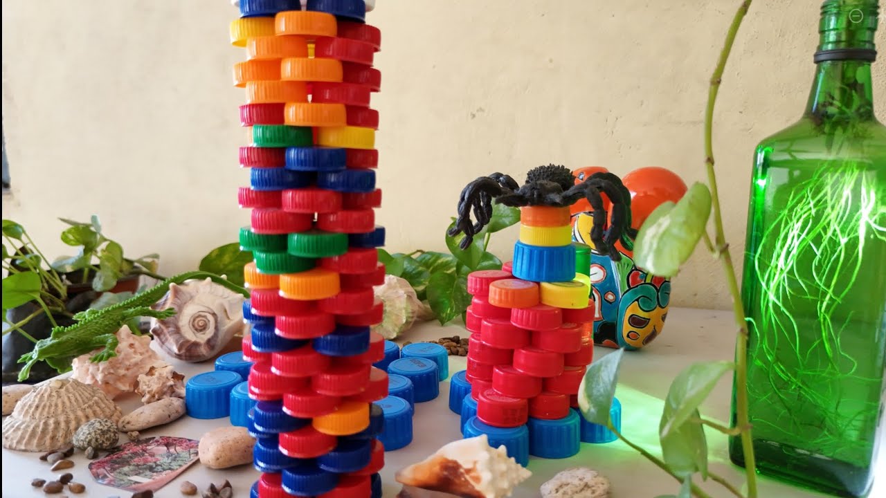 CREATIVIDAD, IMAGINACIÓN, JUEGOS edificio de tapas de plástico,torre de taparoscas #juegos #plastic 