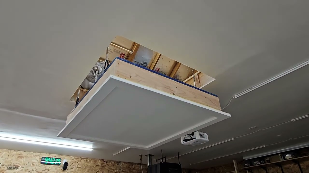 Garage attic hoist lift
