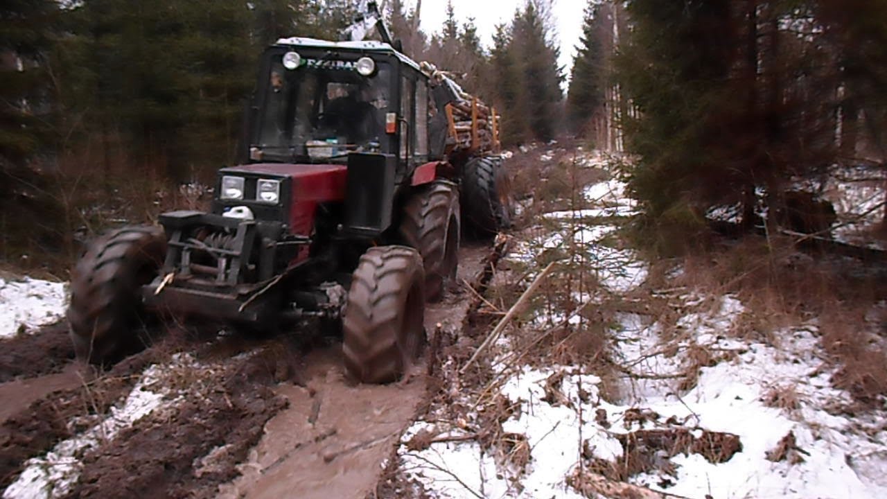 Belarus Mtz 892 with homemade trailer logging in wet snowy forest